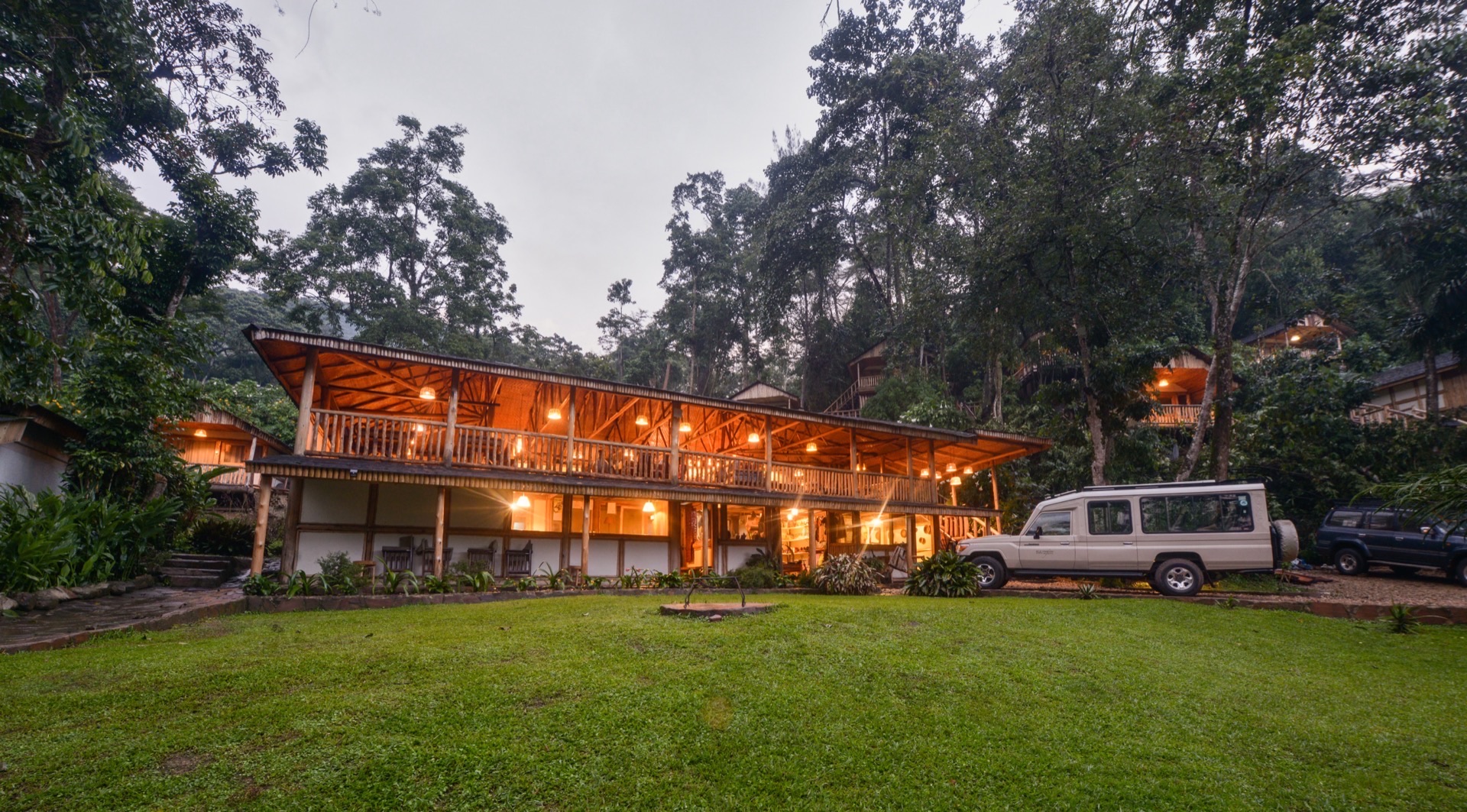 Buhoma Lodge at dusk, on the edge of Bwindi Impenetrable Forest